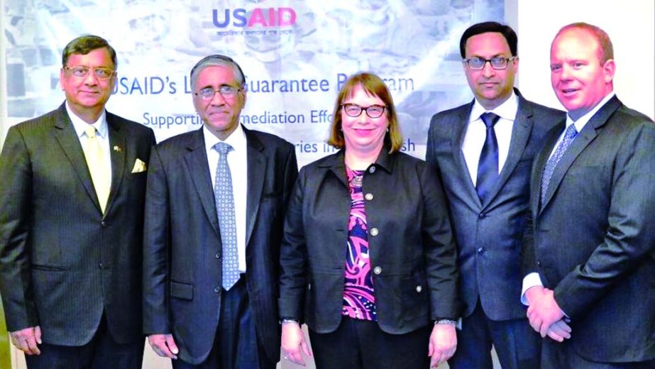 Managing Director of Prime Bank Limited Ahmed Kamal Khan Chowdhury and USAID Bangladesh Mission Director Janina Jaruzelski sign a risk-Sharing guarantee agreement for RMG remediation recently. Alliance for Bangladesh Worker Safety Managing Director Mesba