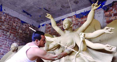 RANGPUR: Artists passing busiest days in making idols as the Hindu community people preparing to celebrate their greatest religious festival Durga Puja from October 18 in Rangpur.
