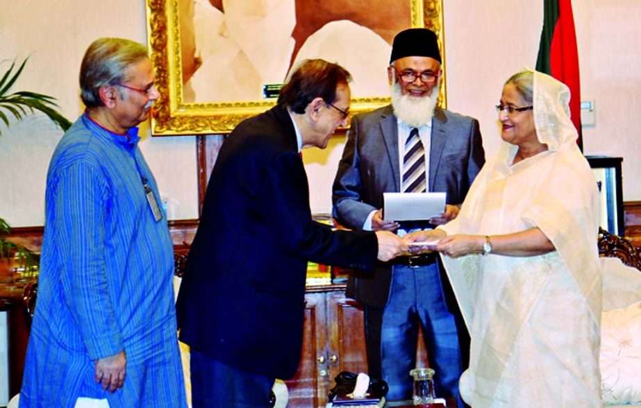 Vice Chairman of ONE Bank Ltd Asoke Das Gupta handing over a cheque for Tk 5 million to Prime Minister Sheikh Hasina to her relief fund recently.