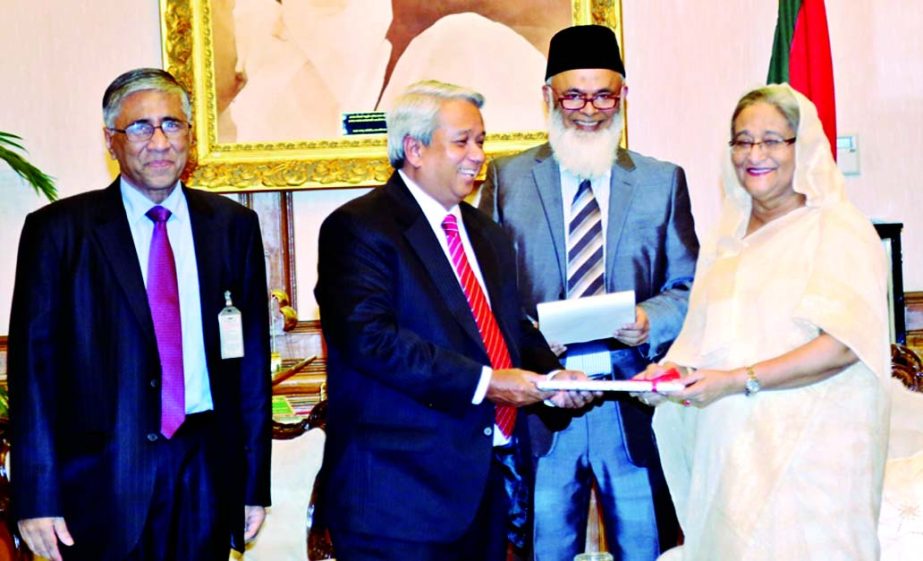 Azam J Chowdhury, Chairman of Prime Bank Ltd handing over a cheque to Prime Minister, Sheikh Hasina to her relief fund recently.