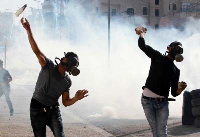 Palestinian protesters clash with Israeli security forces on Wednesday in the West Bank city of Bethlehem.