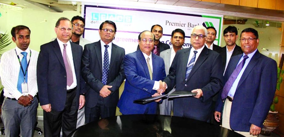 KhondkerFazle Rashid, Managing Director of Premier Bank Ltd and Shaikh Abdul Aziz, Managing Director of LEADS Corporation sign an agreement to introduce of EMV chip cards recently.