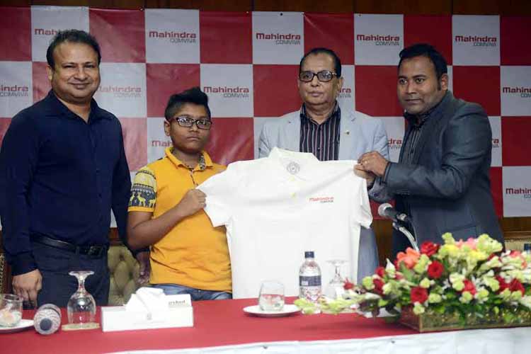 FIDE Master Mohammad Fahad Rahman (2nd from the left) receiving the jersey from Reyad Hasnain (extreme right), Country Manager of Mahindra Comviva in the city on Thursday. State Minister for Youth and Sports Biren Sikder was present on the occasion.