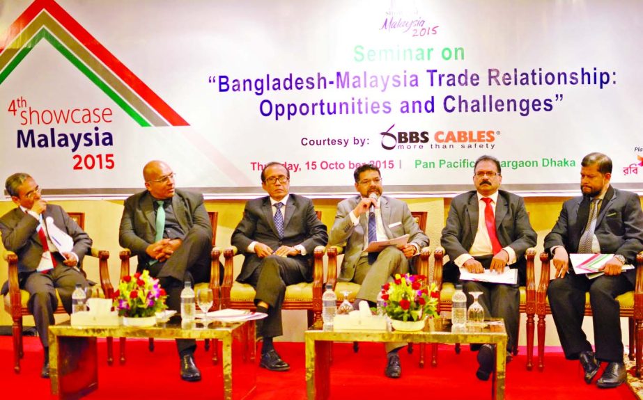 Hossain Khaled, President of Dhaka Chamber of Commerce & Industry, addressing a seminar titled 'Bangladesh-Malaysia Trade Bonding: Opportunities and Challenges' organised in the inaugural ceremony of Showcase Malaysia 2015, at a hotel in the capital on