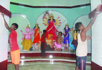 GOURIPUR(Mymensingh) : Preparations for Durga Puja continues in Gouripur Upazila. This picture was taken from Durga Bari Puja Mandap on Thursday.