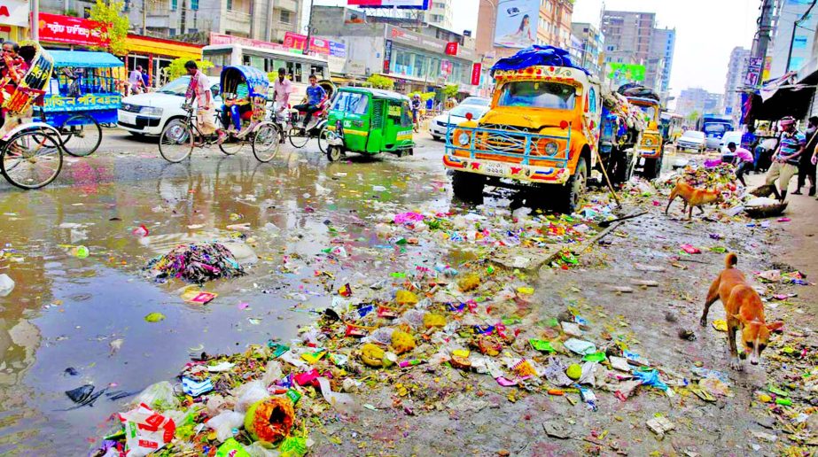 Badda-Gulshan Link Road is in sorry state as city cleaners dumped garbage on it creating obstacles to movement of vehicles as well as polluting the environment. This snap was taken on Friday.