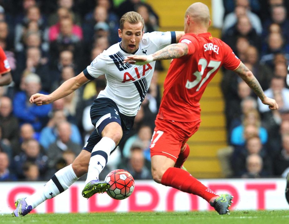 Tottenham's Harry Kane (left) battles with Liverpool's Martin Skrtel during the English Premier League soccer match between Tottenham Hotspur and Liverpool at the White Hart Lane, London, England on Saturday.