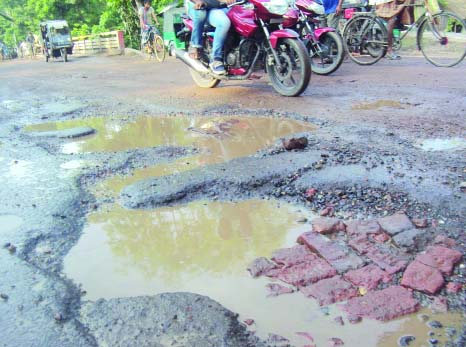 JHENIDAH: Dilapidated Borobazar to Jhenidah Road needs immediate reconstruction. This picture was taken on Saturday.