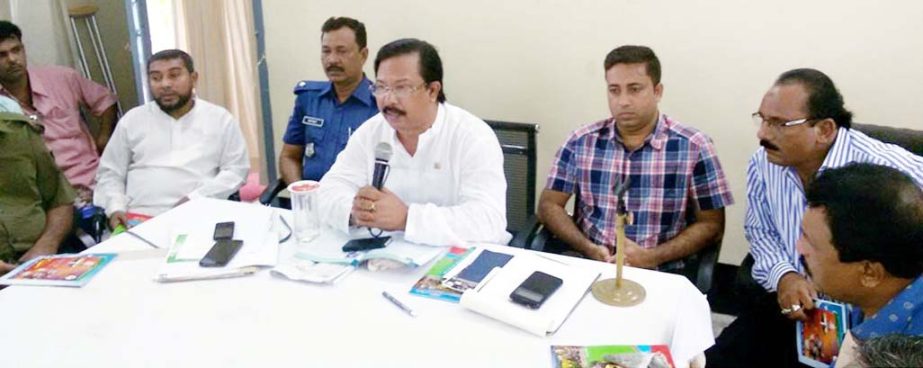 Upazilla Chairman of Rangunia Mohammed Ali Shah addressing at a view exchange meeting at the Auditorium of Rangunia Upazilla Parishad on the occasion of Durga Puja to maintain law and order during the biggest religious festival of the Hindu Community.