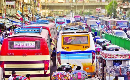 City witnessed massive traffic gridlock as vehicles blocked the road haphazardly following the realisation of penalties from a bus by the mobile court causing immense sufferings to commuters and dwellers on Sunday. This photo was taken from Gulistan area.