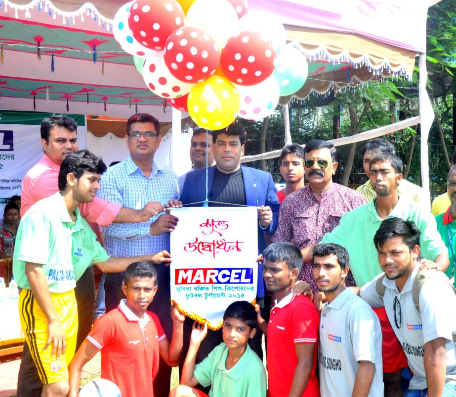 First Senior Additional Director of Walton FM Iqbal Bin Anwar Dawn inaugurating the football tournament for street boys at Palton Maidan on Monday.