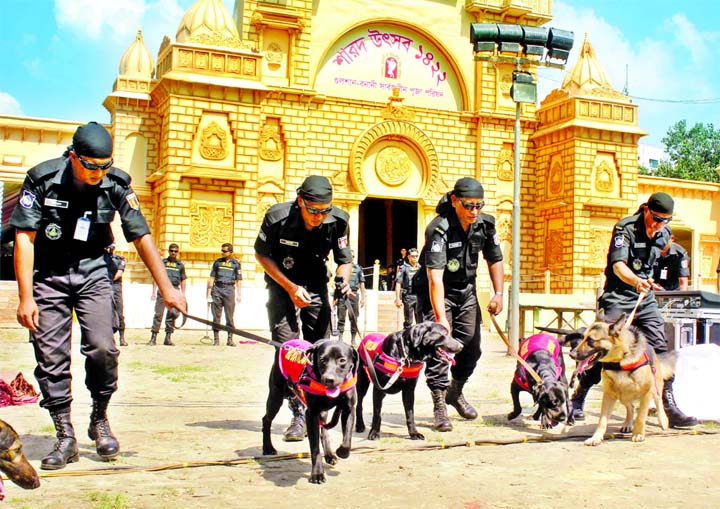 RAB's 'dog squad' deployed in all Puja premises as part of stringent security measures ahead of Durga Puja. This photo was taken from Banani Puja mandap on Monday.