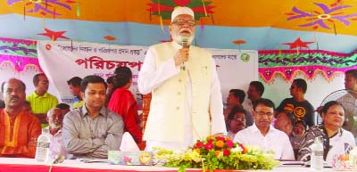 PABNA: Land Minister Shamsur Rahman Sherif speaking at an ID card distribution programme of fishermen at Atghoria Upazila as Chief Guest on Saturday.