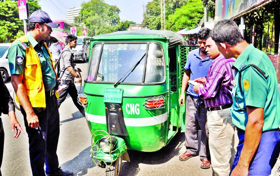 Bangladesh Road Transport Authority conducted Mobile Court drive against vehicles without fitness. The snap was taken from the city's Shahbag on Tuesday.