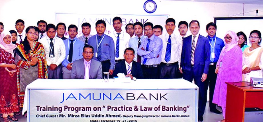 Mirza Elias Uddin Ahmed, Deputy Managing Director of Jamuna Bank Limited, poses with the percipients of a training program on "Practice & Law of Banking" at Surma Tower, Purana Paltan in Dhaka on Monday.