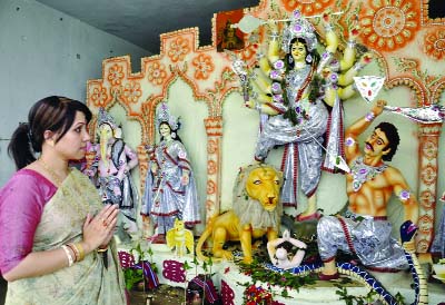 DINAJPUR: The Hindu community of Dinajpur on Thursday observed Maha Ashtami through performing the day's main attraction Kumari Puja .