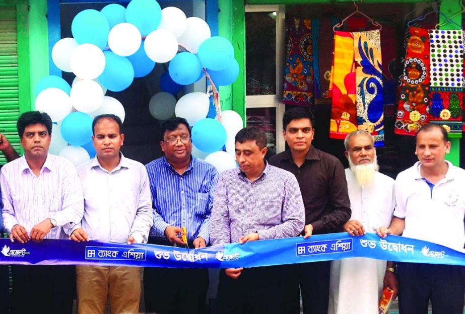 Mohammed Roshangir, Deputy Managing Director of Bank Asia Ltd, inaugurating an agent-banking outlet of the Bank at Naya Bazar Akbar Hat of Sandwip Upazila in Chittagong recently. Md Saiful Islam, First Vice President and Head of EPZ Branch was present.