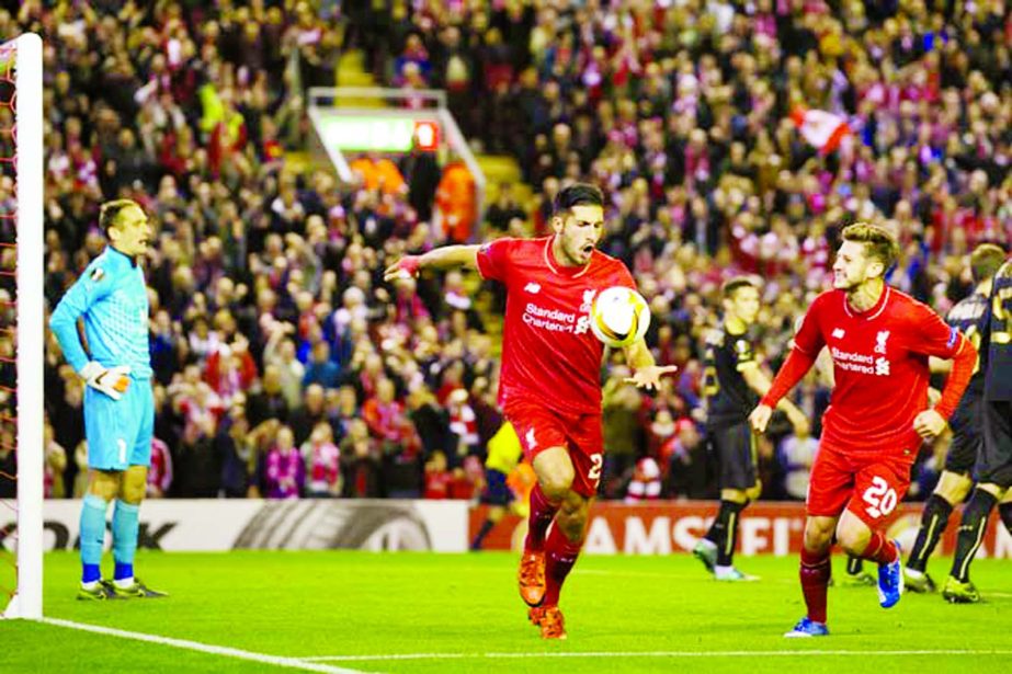 Liverpool's Emre Can (center) celebrates after scoring during the Europa League Group B soccer match between Liverpool and Rubin Kazan at Anfield Stadium, Liverpool, England on Thursday.