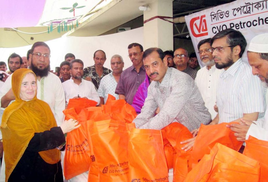 CCC Mayor AJM Nasir Uddin distributing essential commodities at a function on the occasion of the Holy Ashura yesterday.