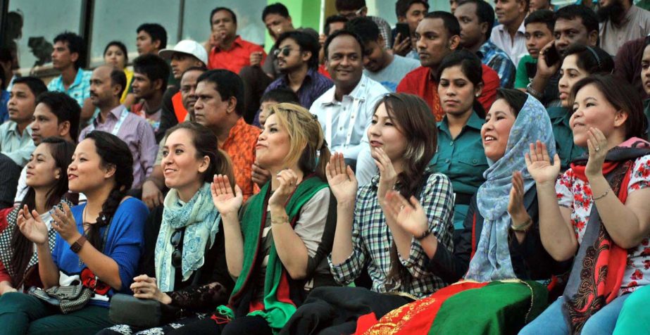 Football fans are enjoying the match of the Sheikh Kamal International Club Cup Football Tournament between De Spin Ghar Bazan Football Club of Afghanistan and Solid FC of Sri Lanka at the MA Aziz Stadium in Chittagong on Sunday. Banglar Chokh