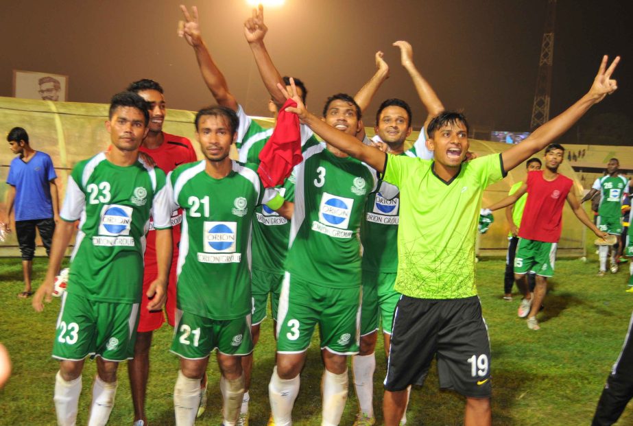Players of Dhaka Mohammedan Sporting Club Limited celebrating after beating Kolkata Mohammedan Sporting Club by 2-1 goals in their match of the Sheikh Kamal International Club Cup Football Tournament at the MA Aziz Stadium in Chittagong on Sunday. By virt