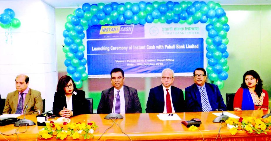 Managing Director Md Abdul Halim Chowdhury, Deputy Managing Director Safiul Alam Khan Chowdhury, Chief Technical Officer & General Manager of Information Technology Division Mohammad Ali of Pubali Bank Ltd, Country Manager of Instant Cash Sanjana Farid po