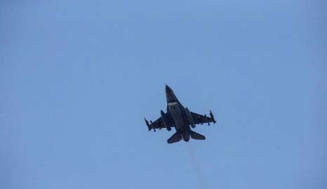 A missile-loaded Turkish Air Force warplane takes off from Turkey's Incirlik Air Base, a staging area for US-led coalition strikes targeting Islamic State positions in Syria