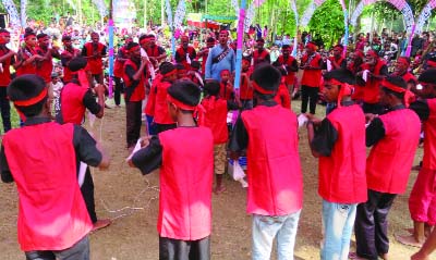 KISHOREGANJ: Participants rendering songs marking Holy Ashura at Boulai village in Kishoreganj Sadar Upazila on Saturday.