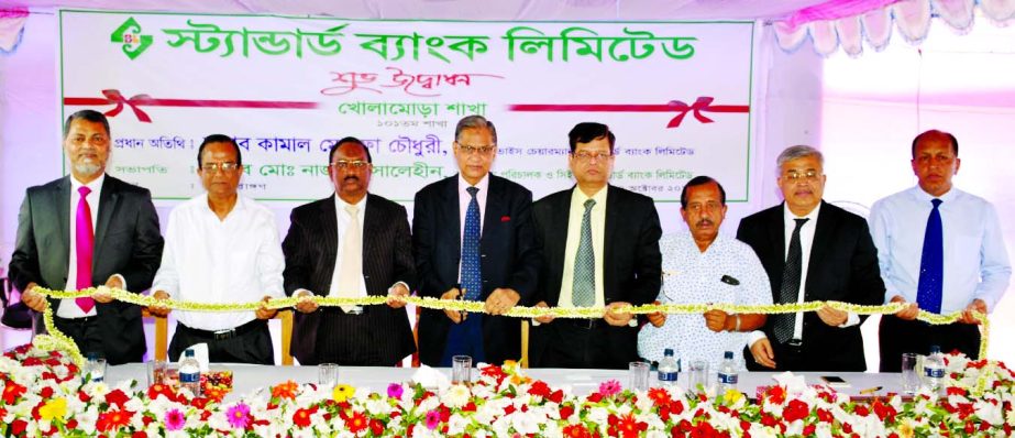 Kamal Mostafa Chowdhury, Vice Chairman of Standard Bank Limited, inaugurating its Kholamora Branch at Abdul Aziz Super Market, Kholamora, South Keraniganj, Dhaka recently. Md Nazmus Salehin, Managing Director of SBL presided.