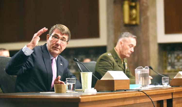 Defence Secretary Ash Carter, accompanied by Joint Chiefs Chairman Gen. Joseph Dunford, testifies on Capitol Hill in Washington on Tuesday, before the Senate Armed Services Committee.