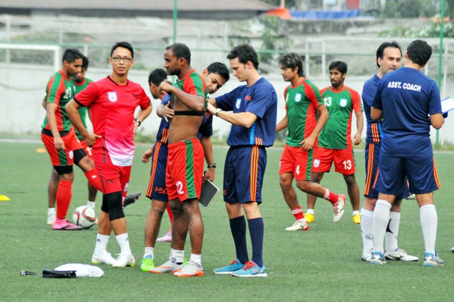 Members of Bangladesh National Football team during their practice session at the BFF Artificial Turf on Wednesday.