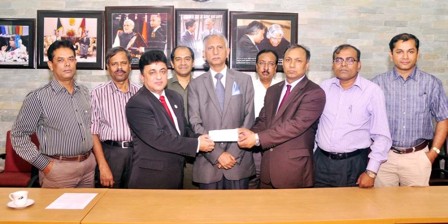 Vice-Chancellor (in-charge) and Treasurer of North South University Dr Gour Gobinda Goswami hands over a cheque for Tk. 24 lakh and 44 thousand to DU Treasurer Prof Dr Md. Kamal Uddin on Wednesday at the DU Vice-Chancellor's office to introduce 'Ronoda