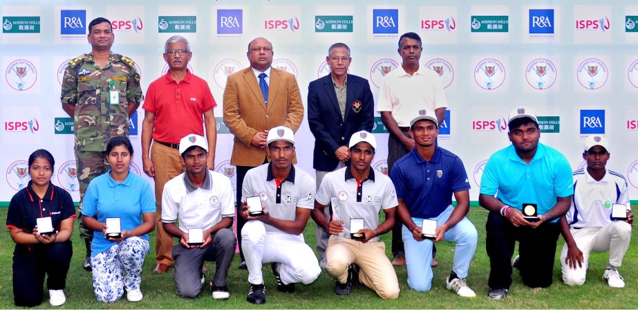 The winners of the Faldo Series Golf Championship of Bangladesh with President of Bangladesh Army Golf Club Major General Hamidur Rahman Chowdhury and the guests pose for a photo session at the Army Golf Club on Thursday. Banglar Chokh