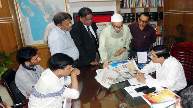 President of Combined Homeopathy Samaj, Chittagong Principal Dr. Abdul Karim handing over Memorandum to DC, Chittagong at his latter's office recently.