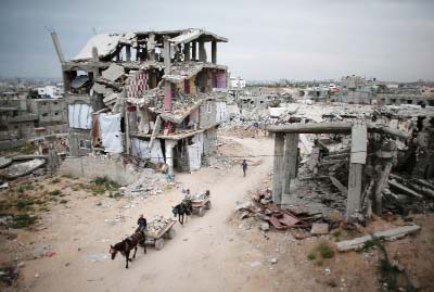 Photo shows damaged homes of Palestinians in Gaza city due to Israeli attack.