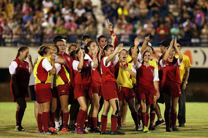 Indigenous players from Canada celebrate the victory against Brazil's Xerentes team during a soccer game at the World Indigenous Games in Palmas, Brazil on Friday.