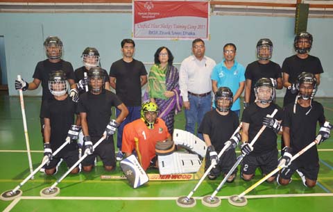 Members of Bangladesh Special Olympics Floor Hockey team pose for a photo session on Saturday before leaving the city for South Korea to take part in the Regional five-a-side Unified Floor Hockey Competition scheduled to be held in South Korea from Novemb