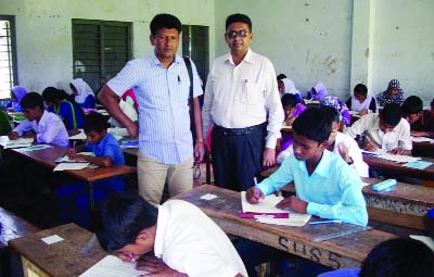 SAPAHAR(Naogaon): Md Shafiqul Islam, Sapahar Upazila Education Officer visiting a JSC examination centre at Sapahar Pilot High School yesterday.