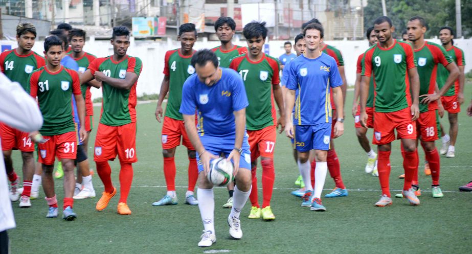 Members of Bangladesh National Football team during their practice session at BFF Artificial Turf on Monday.