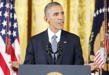 US President Barack Obama talking to newsmen at White House in Washington. AP file photo
