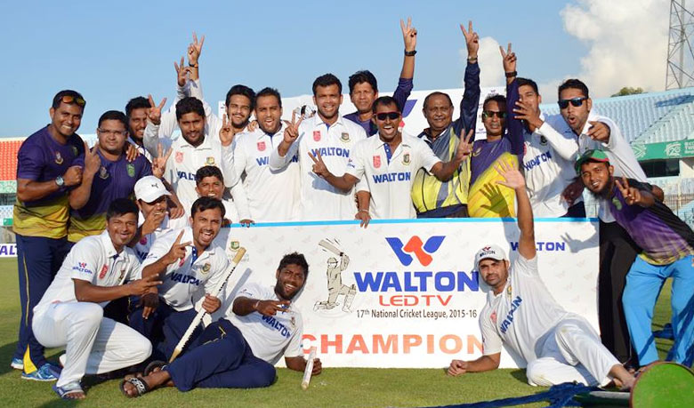 Members of Khulna Division team, the champions of the Walton LED TV 17th National Cricket League pose for a photo session at Zahur Ahmed Chowdhury Stadium in Chittagong on Tuesday.