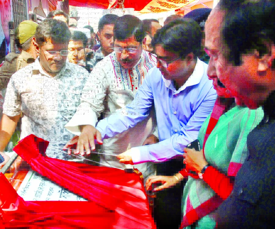 Dhaka South City Corporation Mayor Mohammad Sayeed Khokon unveiled the plaque of newly constructed road in the city's Zurain area on Wednesday.