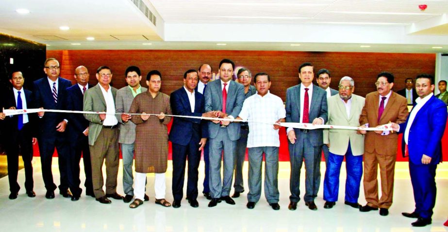 Showkat Aziz Russell, Director of United Commercial Bank Limited inaugurating its 151st Nikunja branch in Dhaka at a hotel in the city. Muhammed Ali, Managing Director of the bank was present.