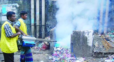 SYLHET: Members of Sylhet City Corporation operating a drive against mosquito in Sylhet city yesterday.