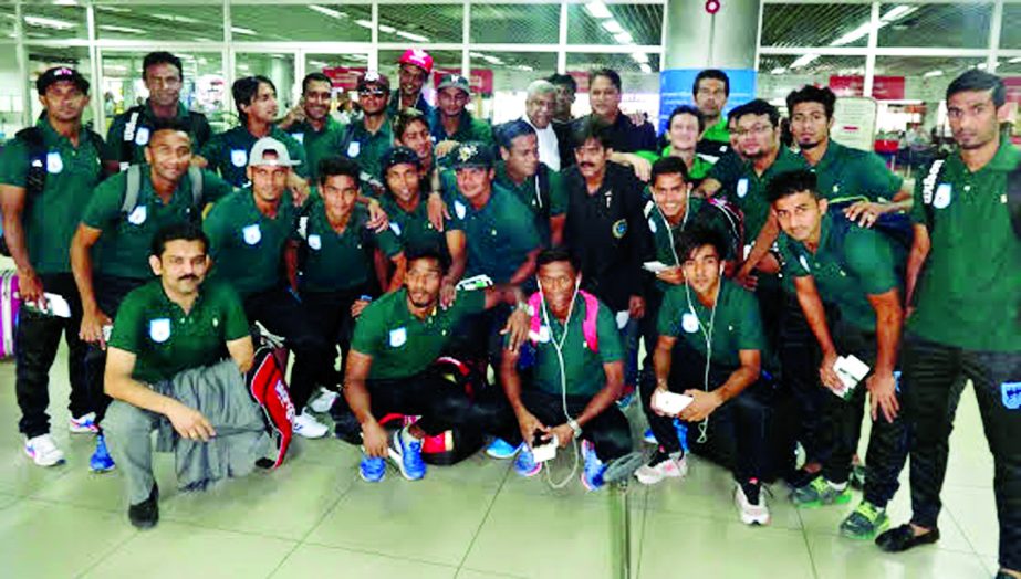 Members of Bangladesh National Football team pose for a photo session at the Hazrat Shahjalal International Airport on Friday.