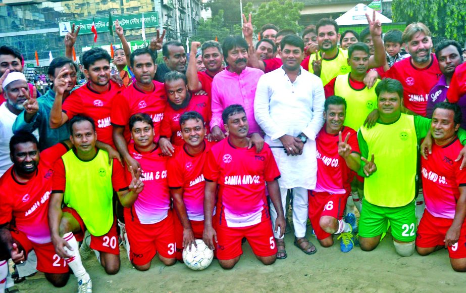 Members of Lalbagh Friends Club pose for a photo session at Abdul Alim Ground in the city on Friday. Lalbagh Friends Club became champions of the Football Tournament after defeating Greenland Duars Veterans Club Jolpaiguri of India by three goals to nil.