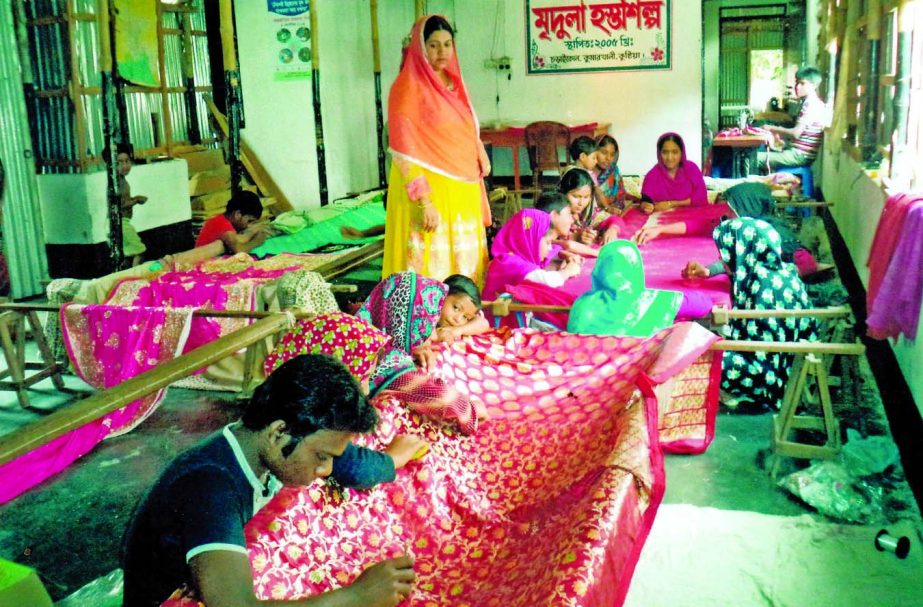 Halima Khatun, an educated housewife, directing her handy craft business financed by Islami Bank Bangladesh Limited at Kumarkhali, Kushtia. Currently 400 workers are working in her business.