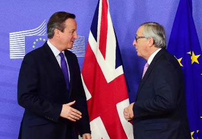 British Prime Minister David Cameron shaking hands with European Commission's president Jean-Claude Juncker.