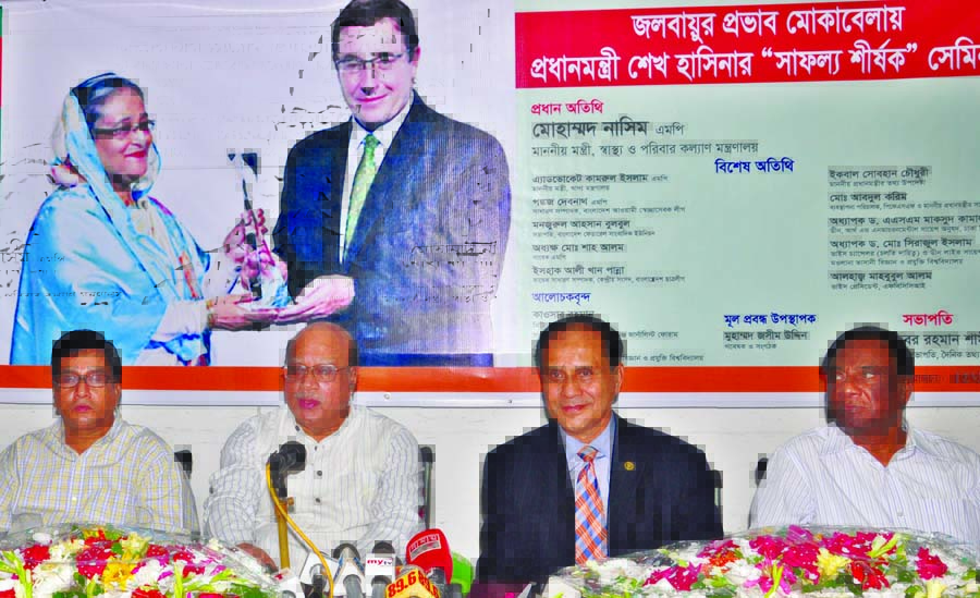 Health Minister Md Nasim speaking at a discussion organised by Tathyo Darpon on contribution of Prime Minister Sheikh Hasina to face climate change impact in Bangladesh held at the Jatiya Press Club on Sunday.