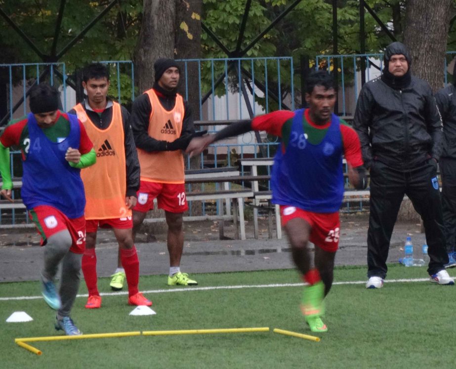 Members of Bangladesh National Football team taking part at their practice session at the Dushanbe Outer Stadium Artificial Turf in Tajikistan on Tuesday.